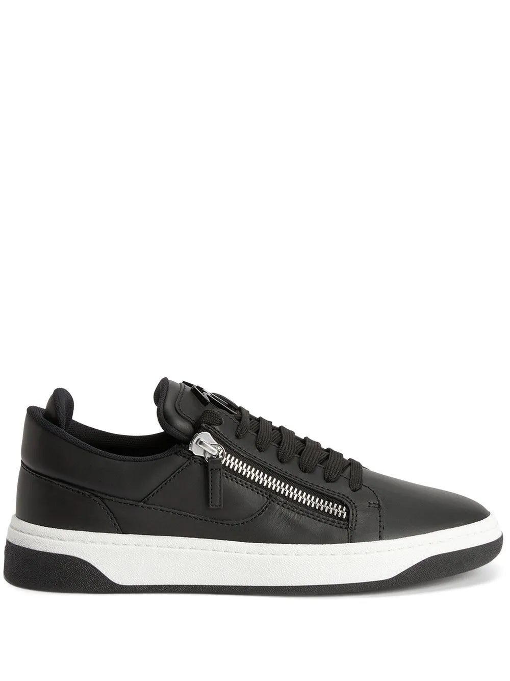 Black low-top sneakers with dual zippers and white rubber sole