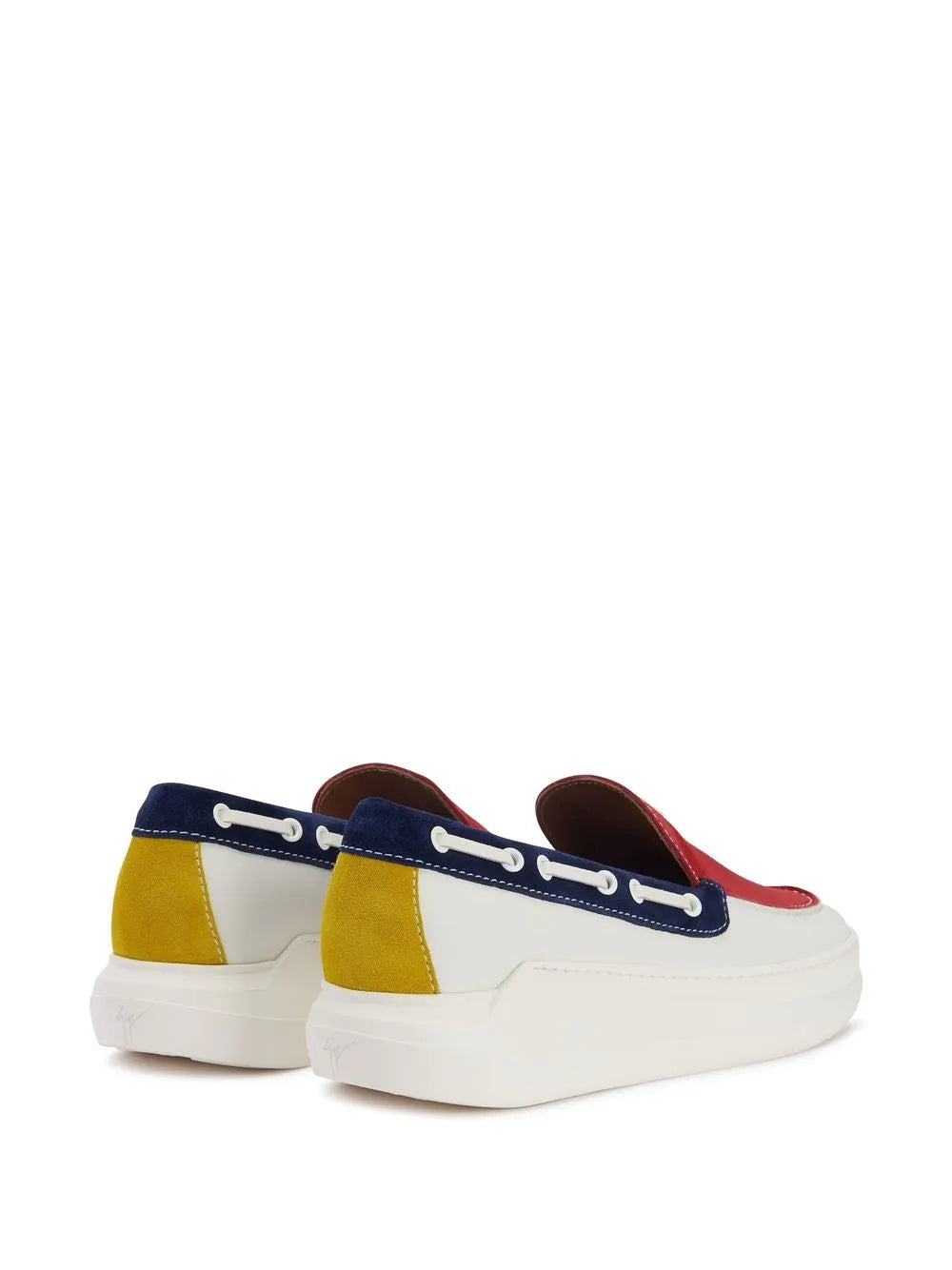 Color-block low-top sneakers: white sole, navy strap, red and yellow side panels