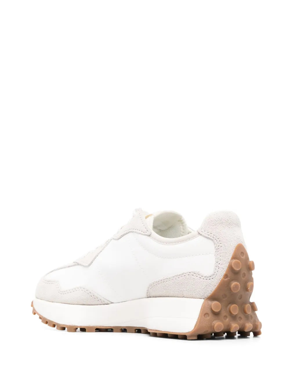 New Balance low-top sneaker, heel view in white with tan rubber pods and gum sole