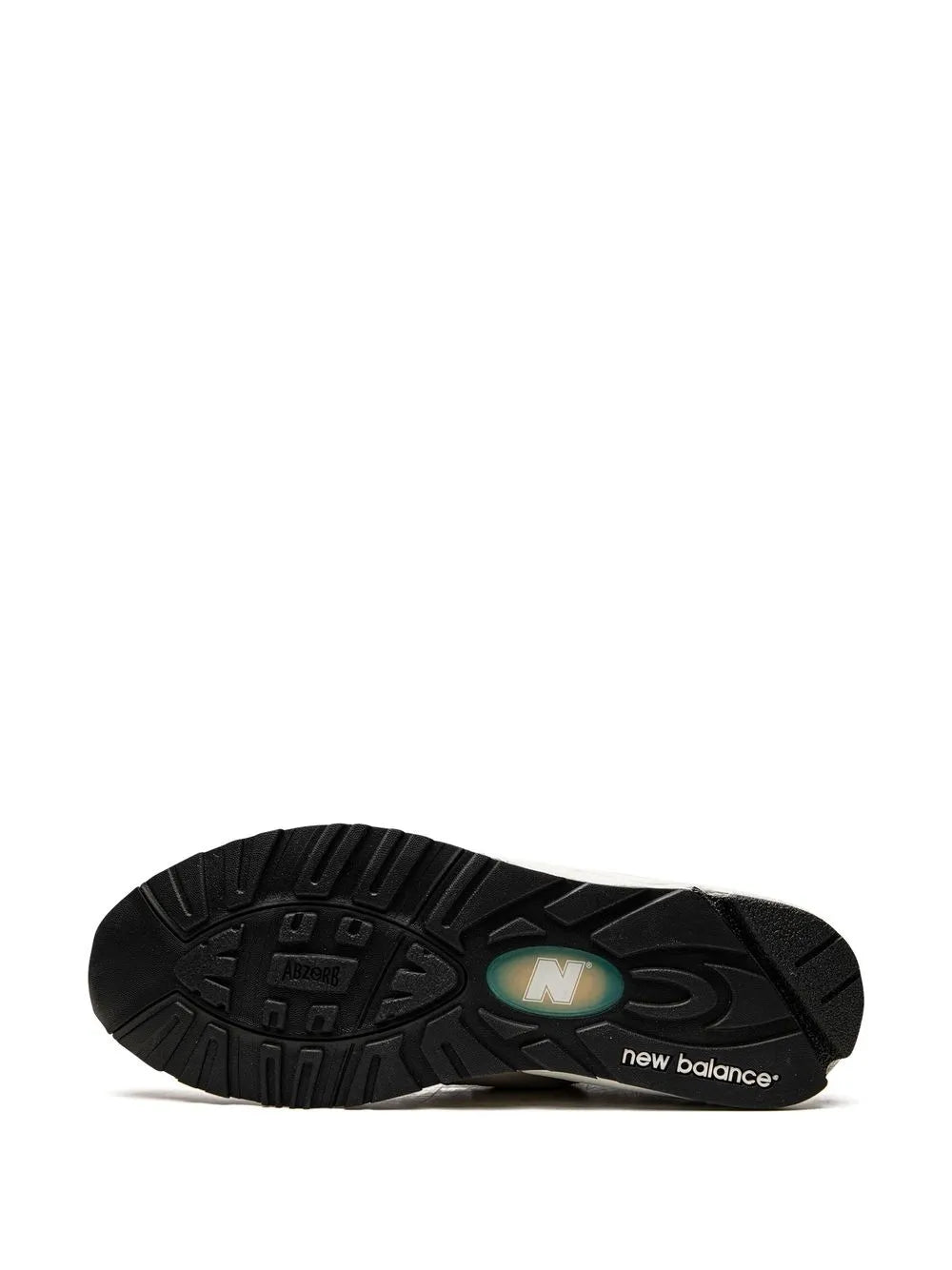 Black rubber outsole with traction tread and N logo on toe