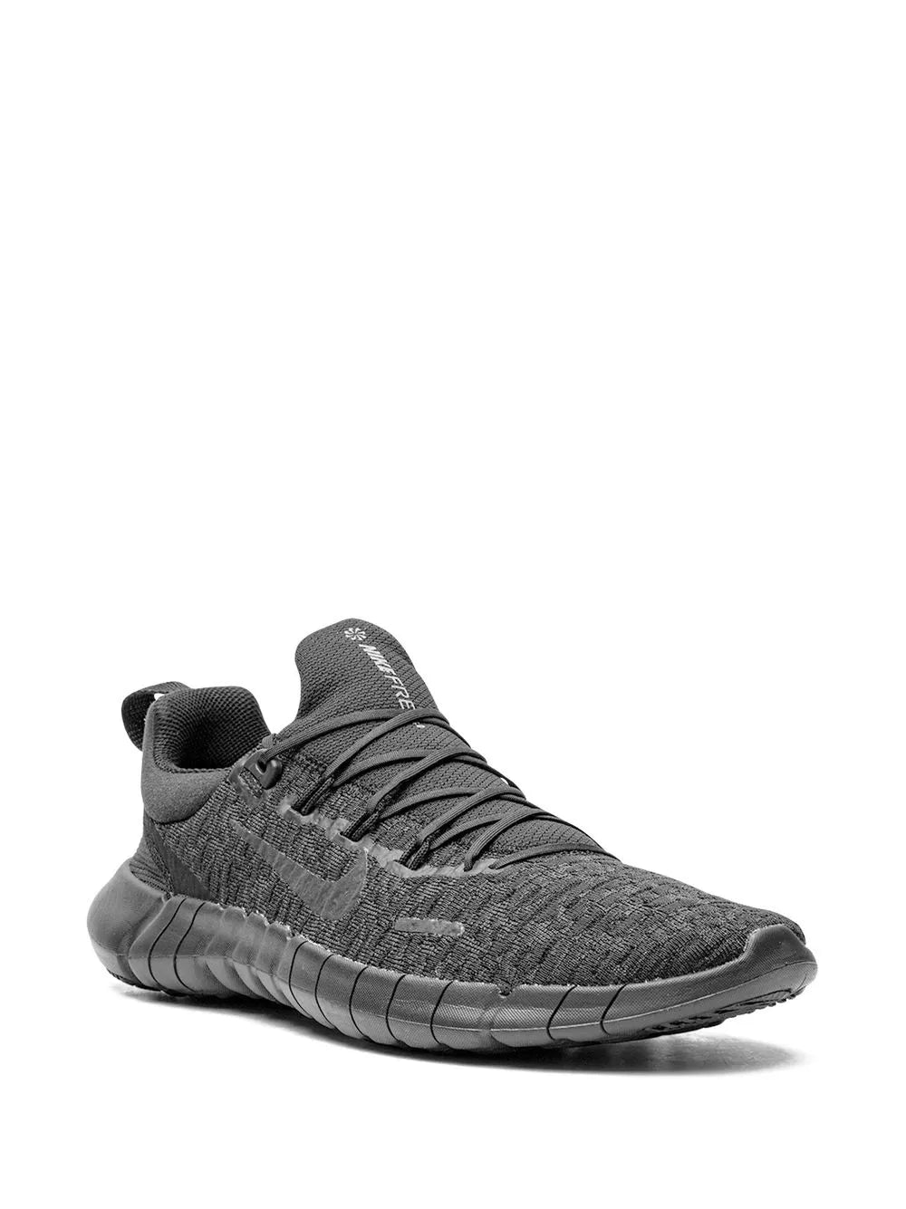 Nike knit running shoe in dark gray, lace-up with flexible segmented midsole