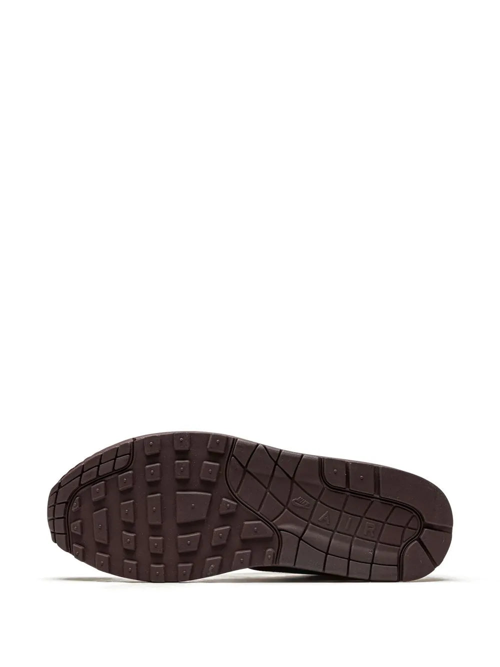 Maroon rubber outsole with tread pattern