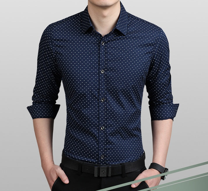 Men's dress shirt in navy blue with small dot pattern, button-up placket and cuffs