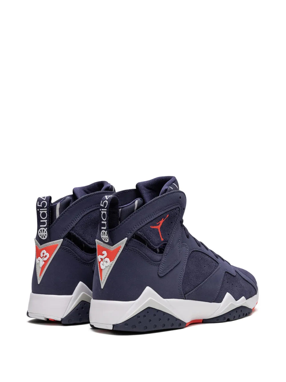 Navy blue high-top sneakers with red heel tab and contrasting side emblem, white midsole