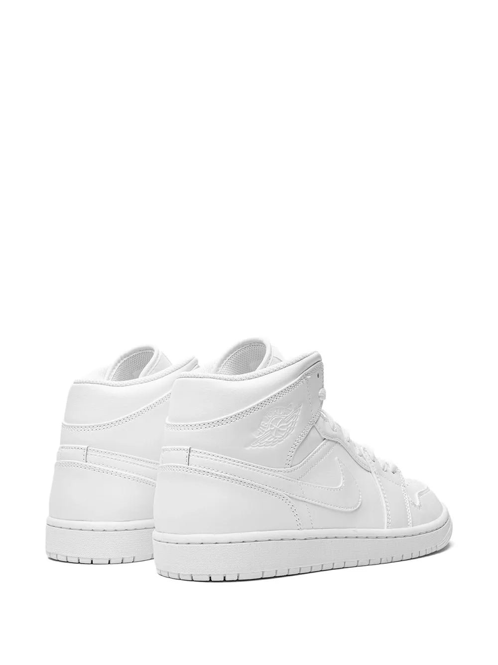 White mid-top lace-up sneaker with padded collar, rear/side view