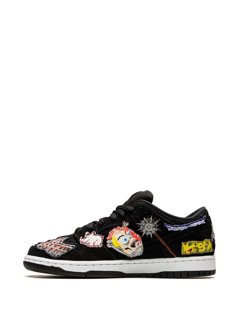 Black low-top skate sneaker with colorful character patches and white midsole