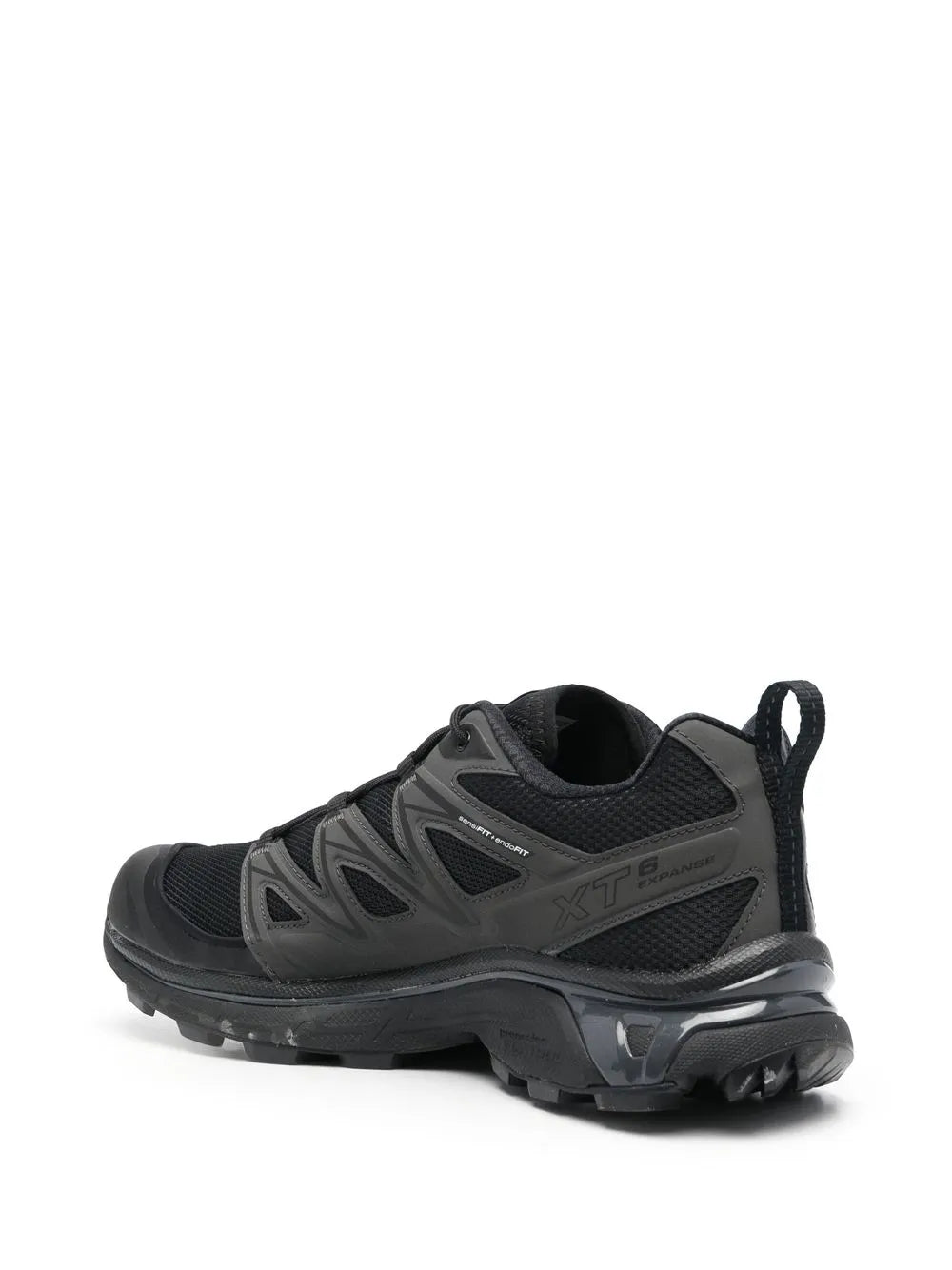 Black lace-up sneaker with X-shaped side panels, cushioned heel, and chunky outsole