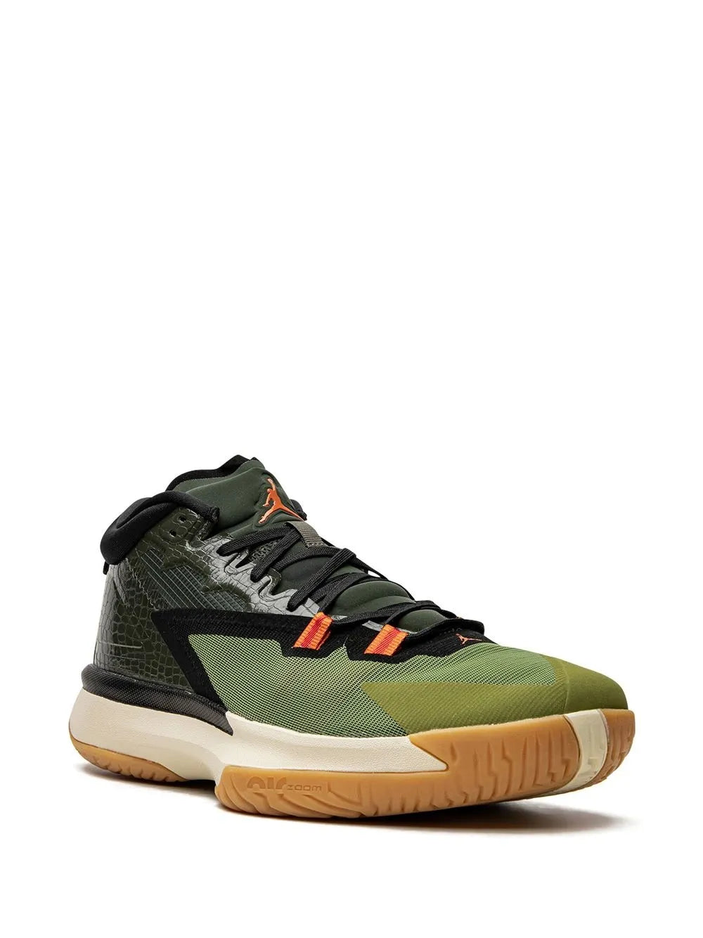 Olive and black low-top sneaker with lace-up, textured upper, and orange details