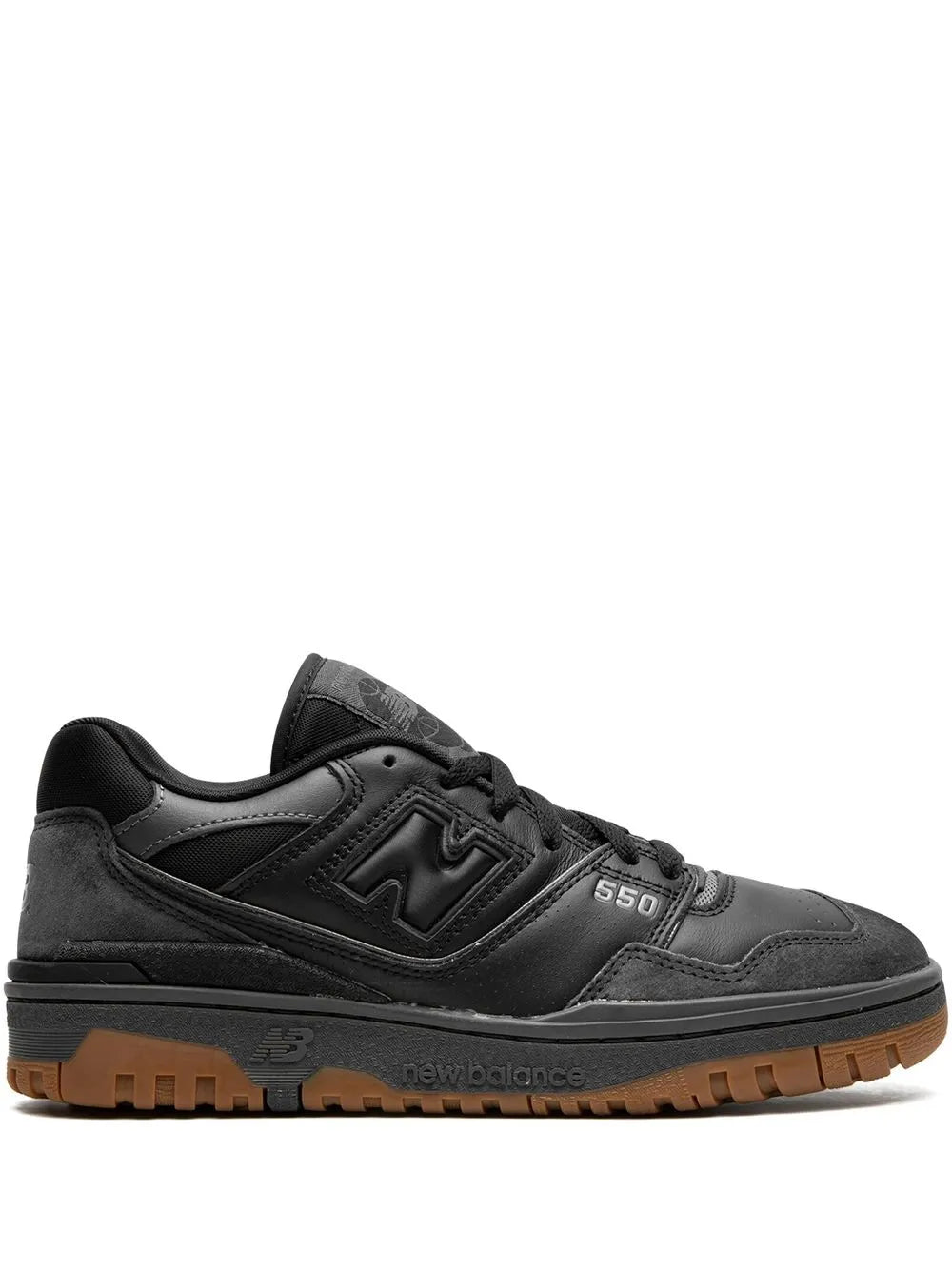 Black suede New Balance 550 sneakers with gum rubber outsole and lace-up closure