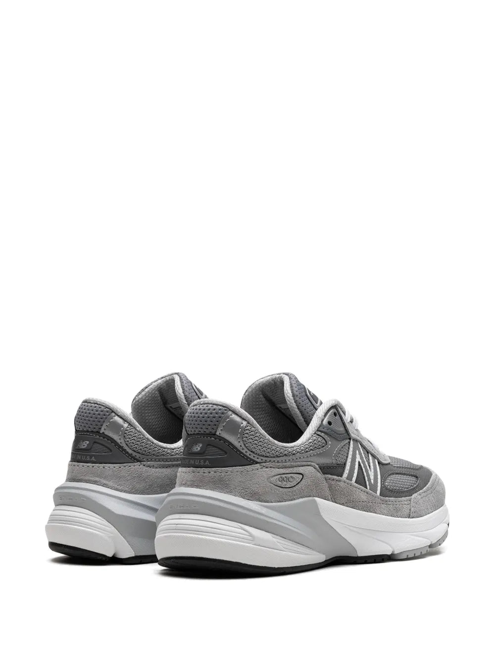 Grey New Balance sneakers, heel and side view, padded collar and wavy sole