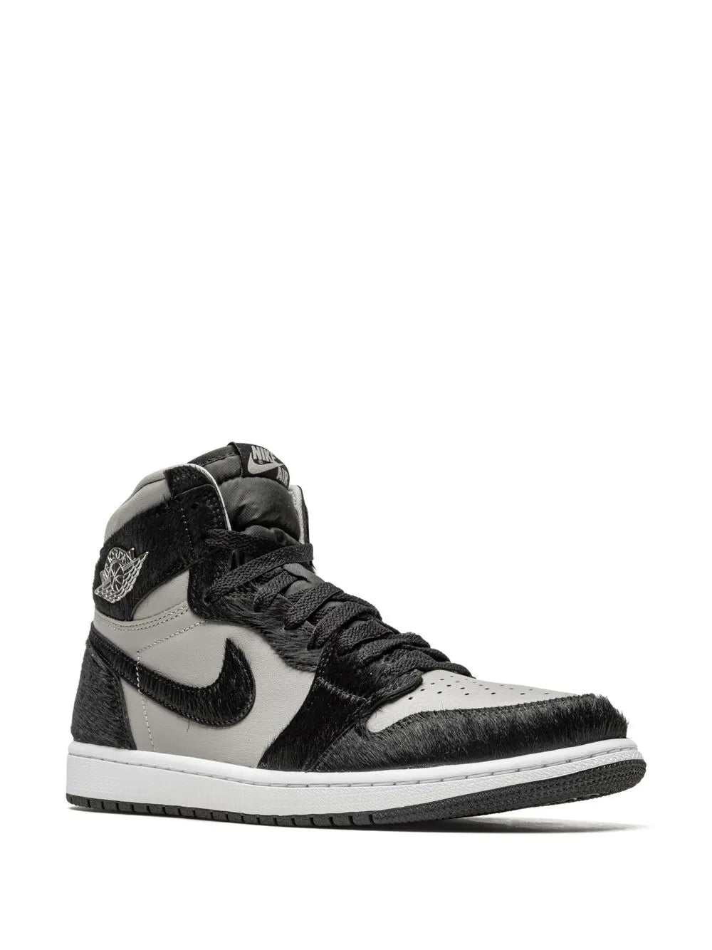 Black and white Air Jordan 1 high-top sneaker, side view with lace-up and swoosh