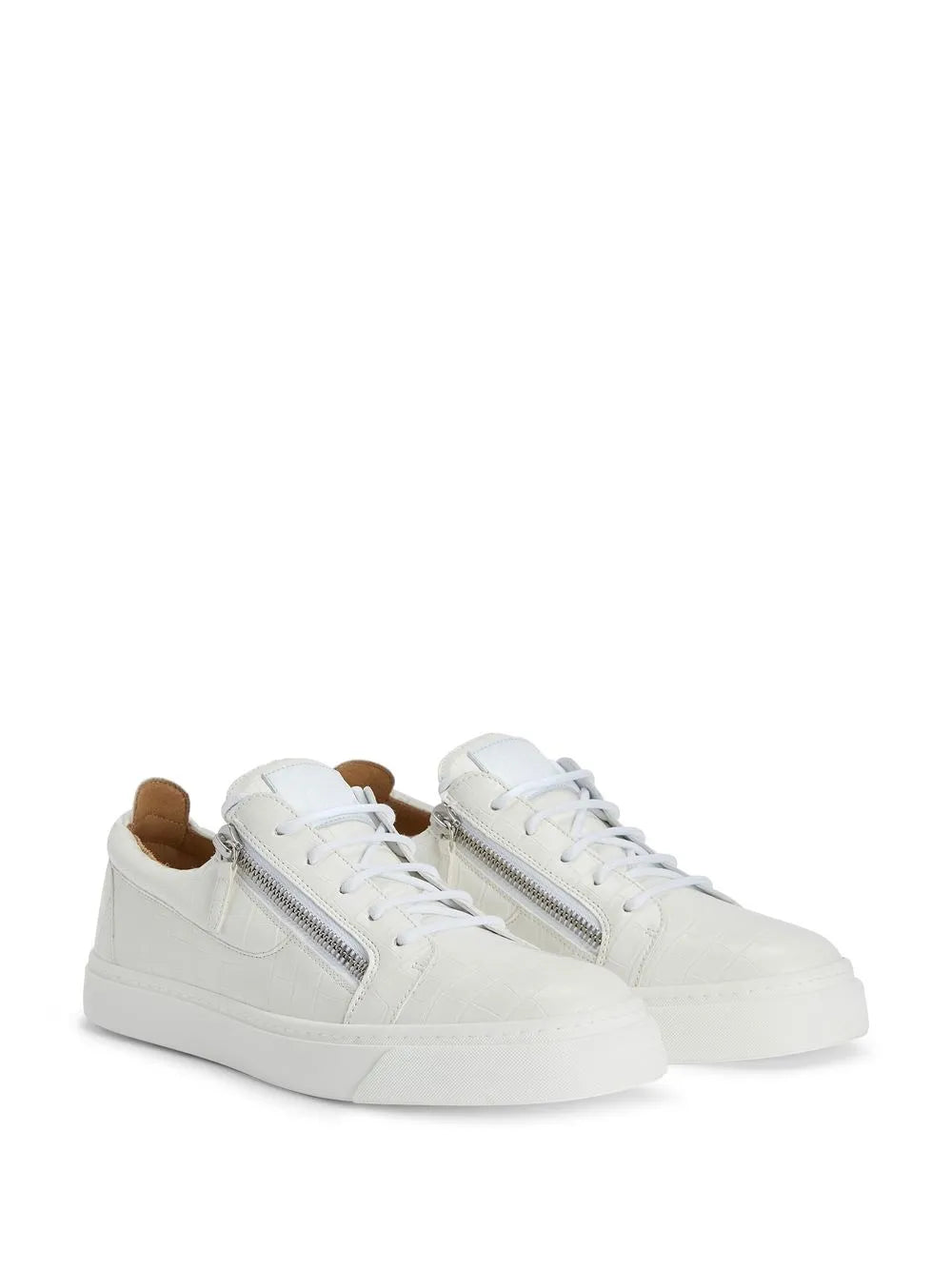 White low-top sneakers, angled view, side double zippers and lace-up