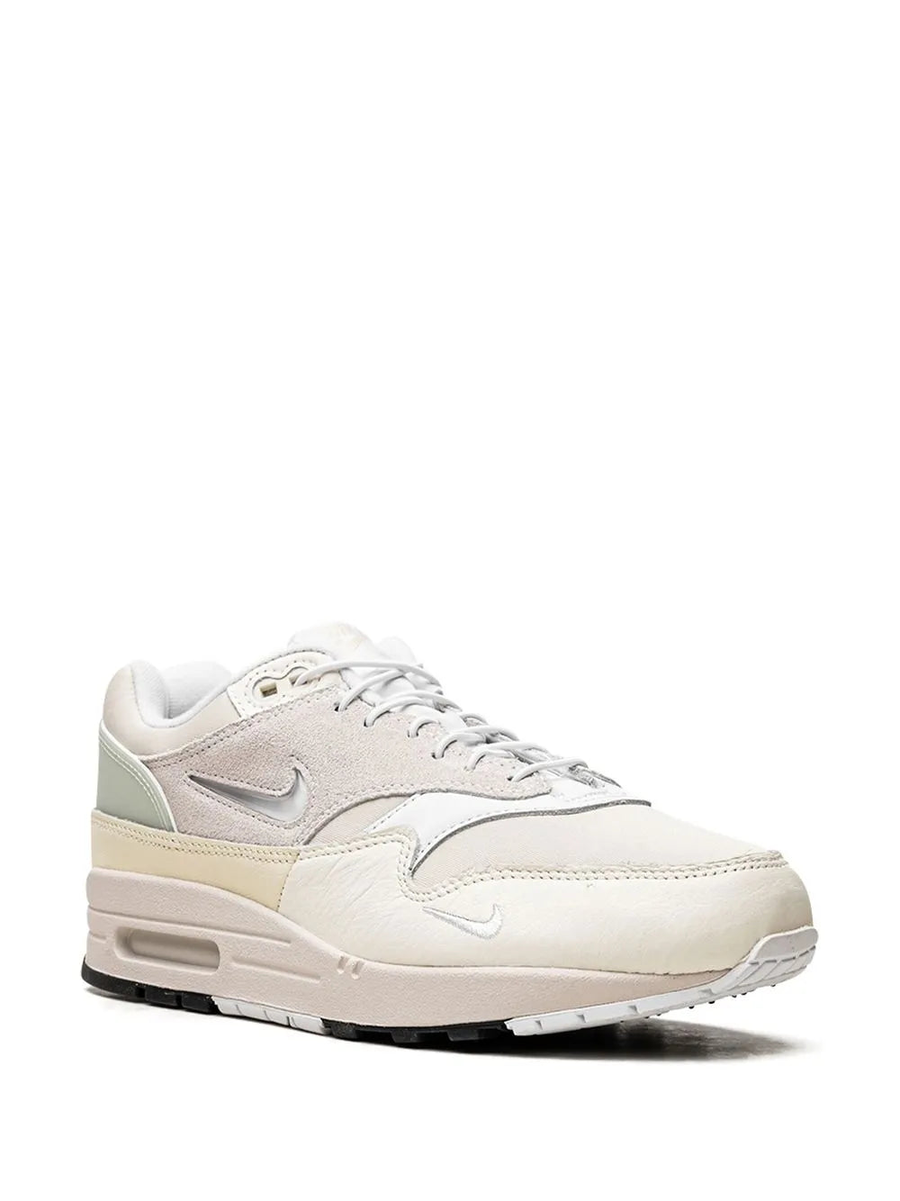 Nike Air Max 1 sneakers, beige and cream tones, lace-up front with Swoosh