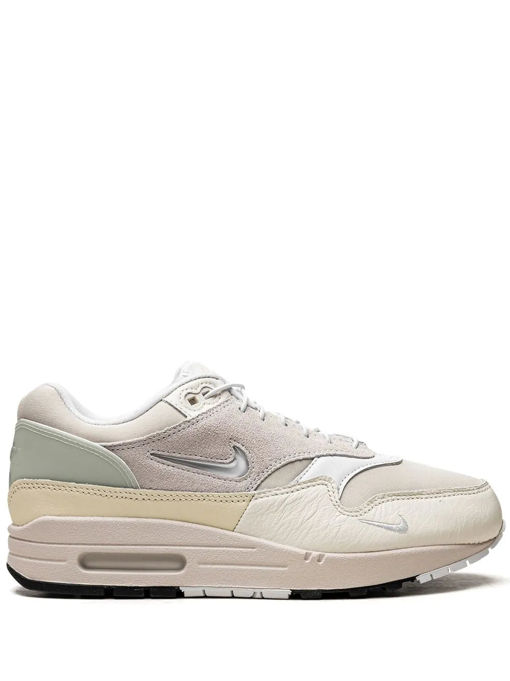 Nike Air Max 1 sneakers, beige leather upper, Swoosh, visible air unit sole