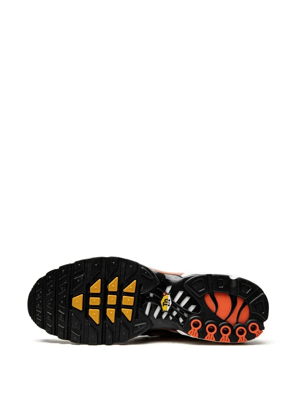 Outsole of orange and black sneakers with textured tread and circular grip pattern