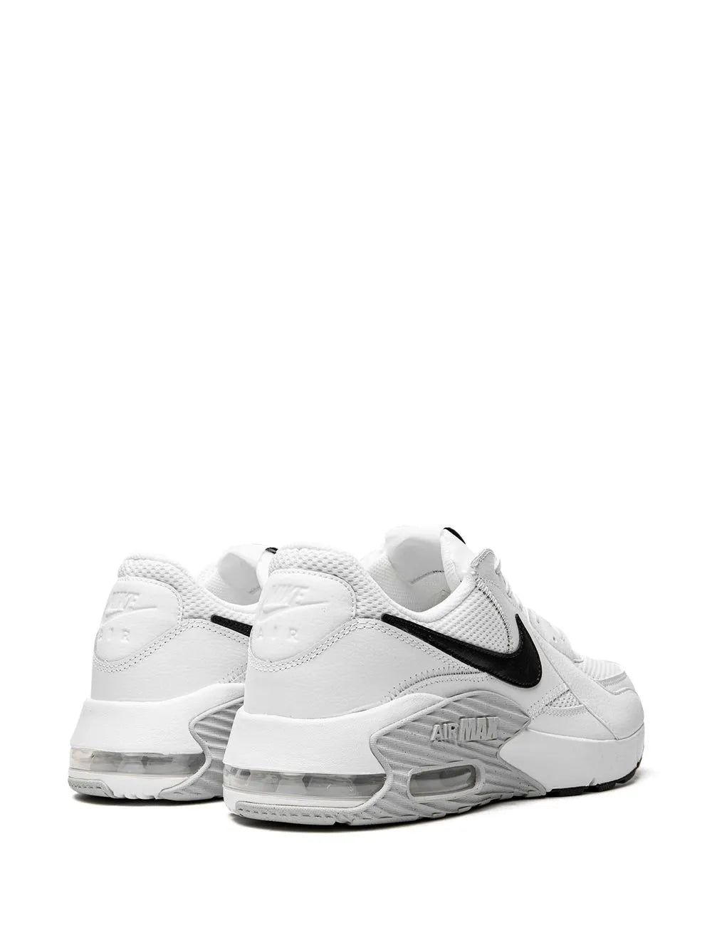Nike Air Max Excee sneaker pair, white textured upper with black swoosh and Air Max detailing