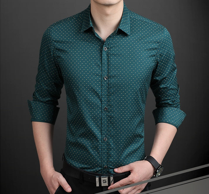 Men's dress shirt in green with small dot pattern, button-up front and rolled sleeves