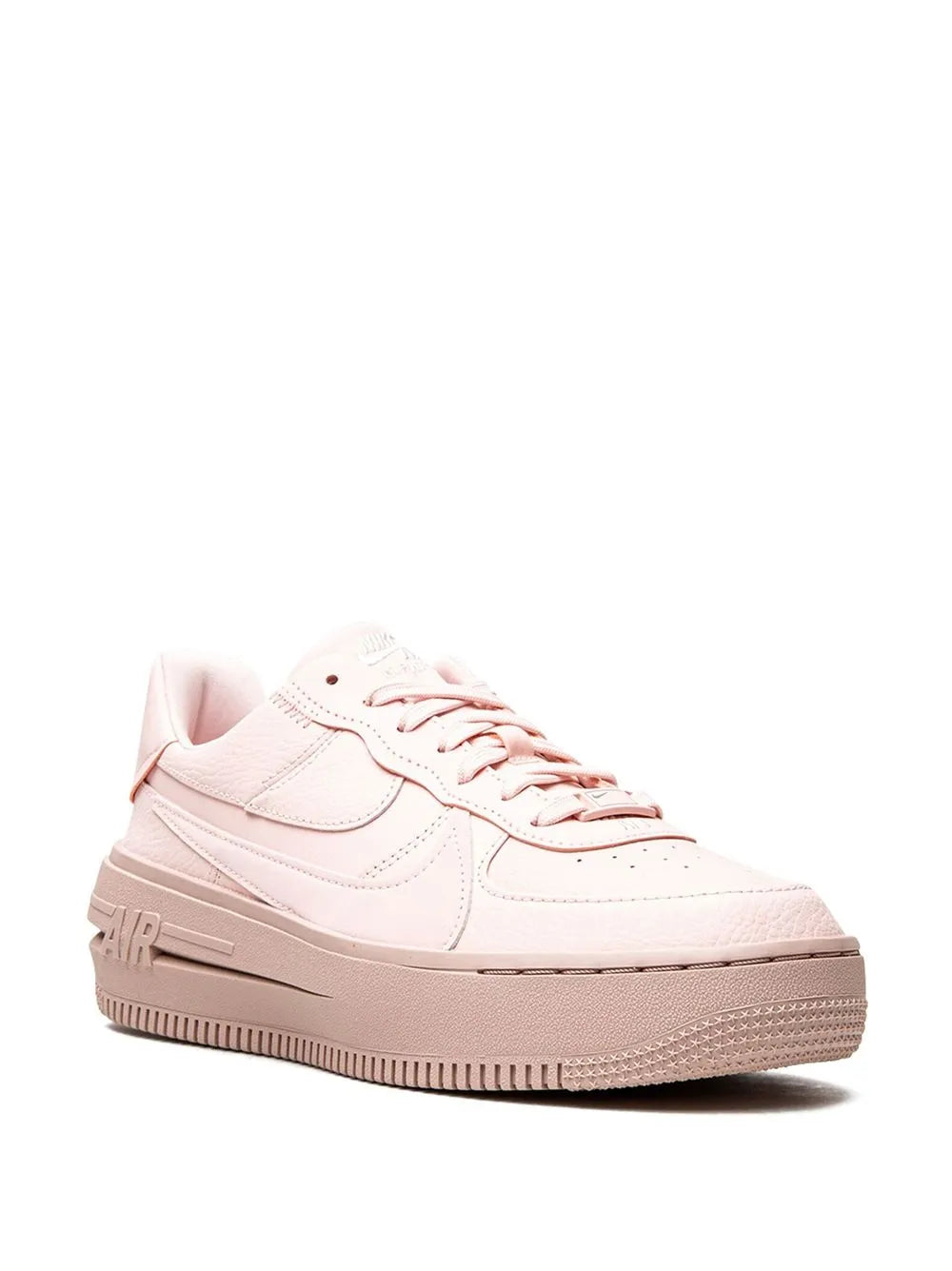 Nike Air Force 1 sneakers, light pink upper with visible lace eyelets and midsole