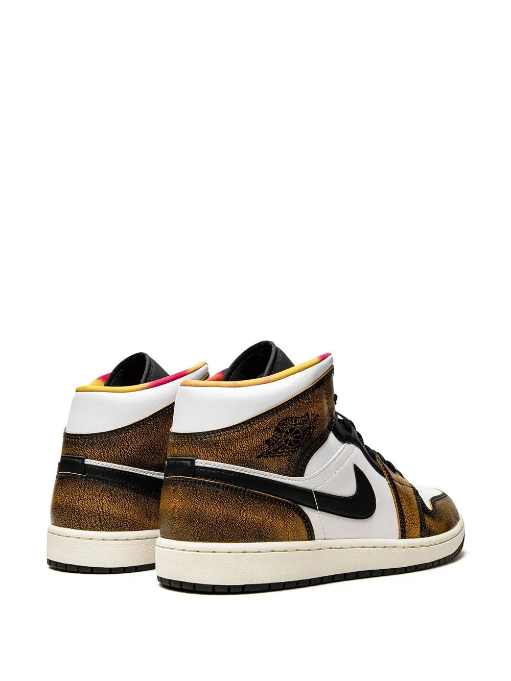 Pair of mid-top sneakers, brown wear-away leather, black Swoosh, white sides and soles