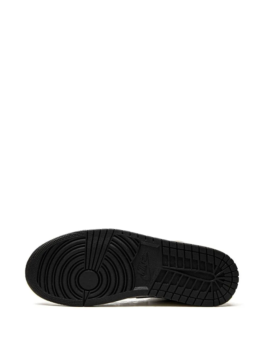 Black rubber outsole for mid-top sneakers with circular traction pattern
