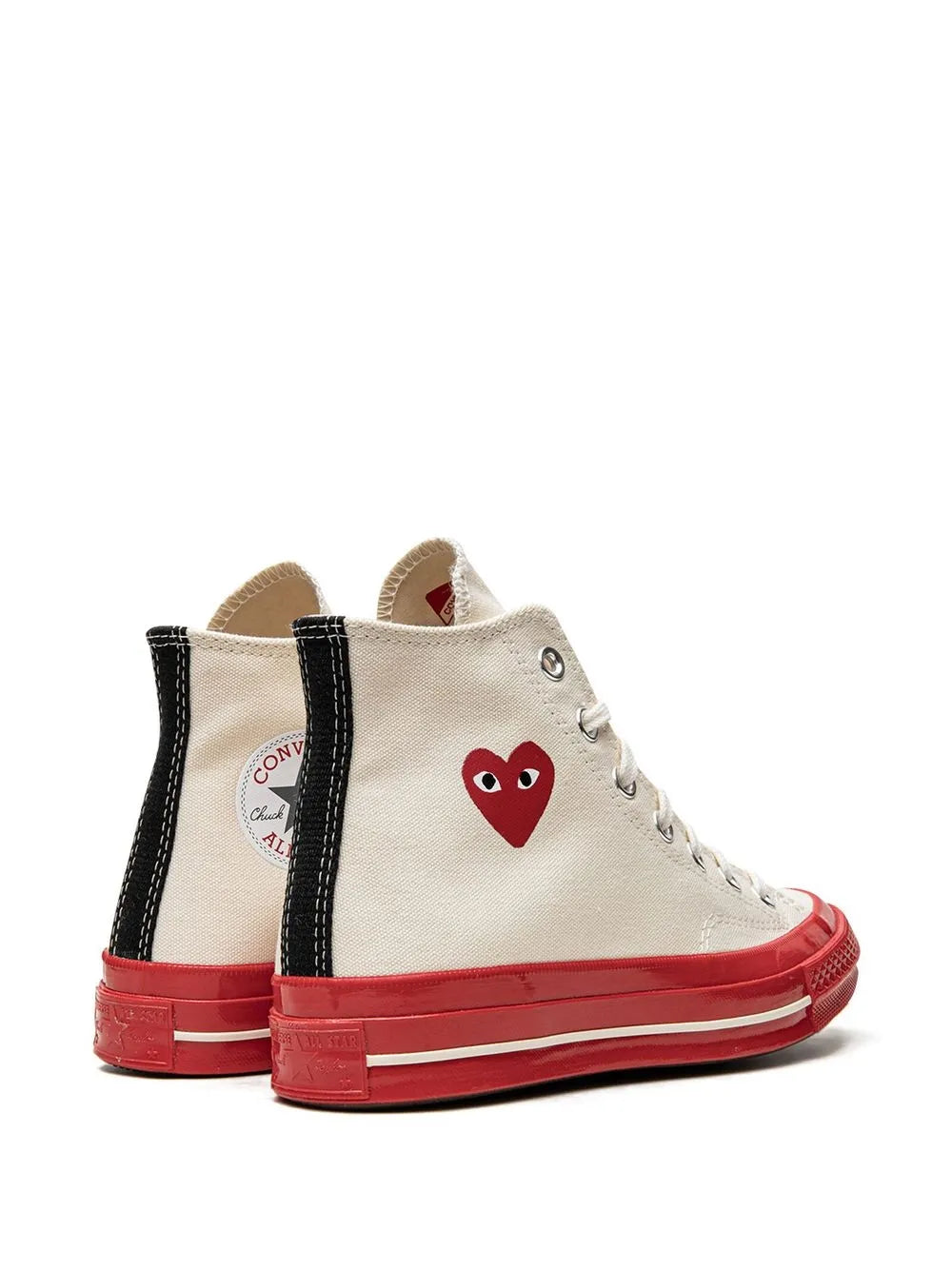 Pair of cream high-top sneakers with red heart patch and black heel panels