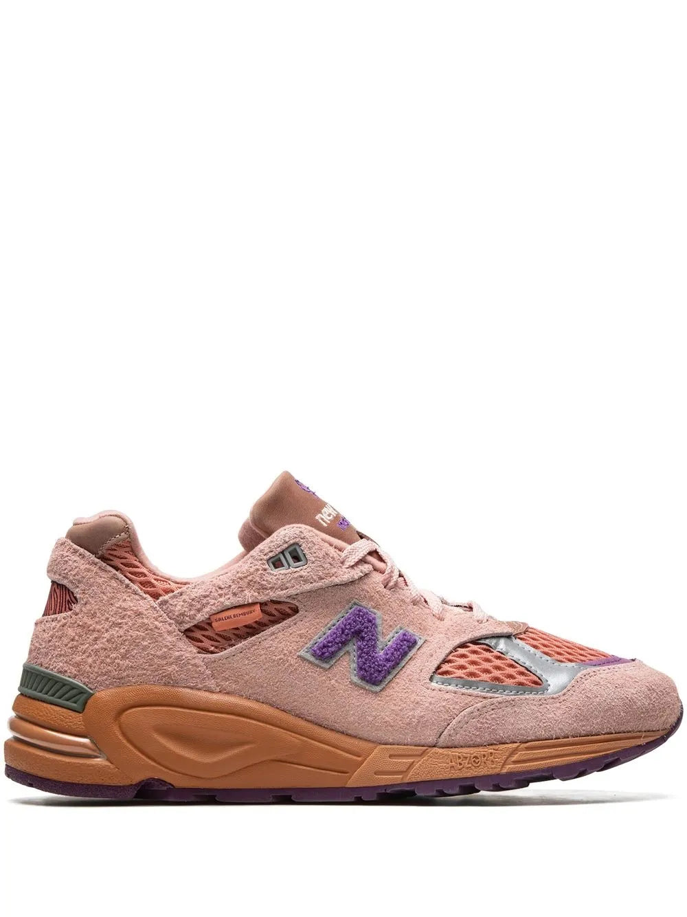 Light pink suede New Balance 990V2 sneakers with orange and purple details