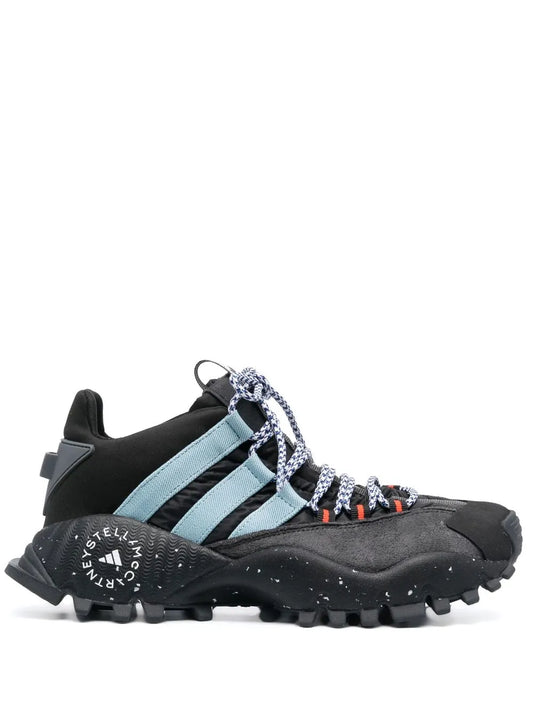 Black lace-up sneaker with ridged sole, light blue adidas stripes and woven laces