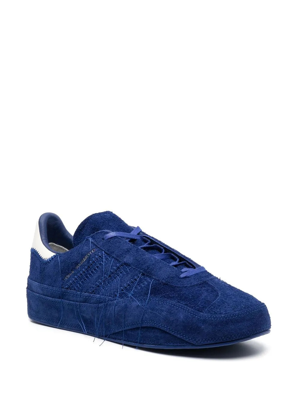 Blue suede low-top sneaker with lace-up and textured side panels