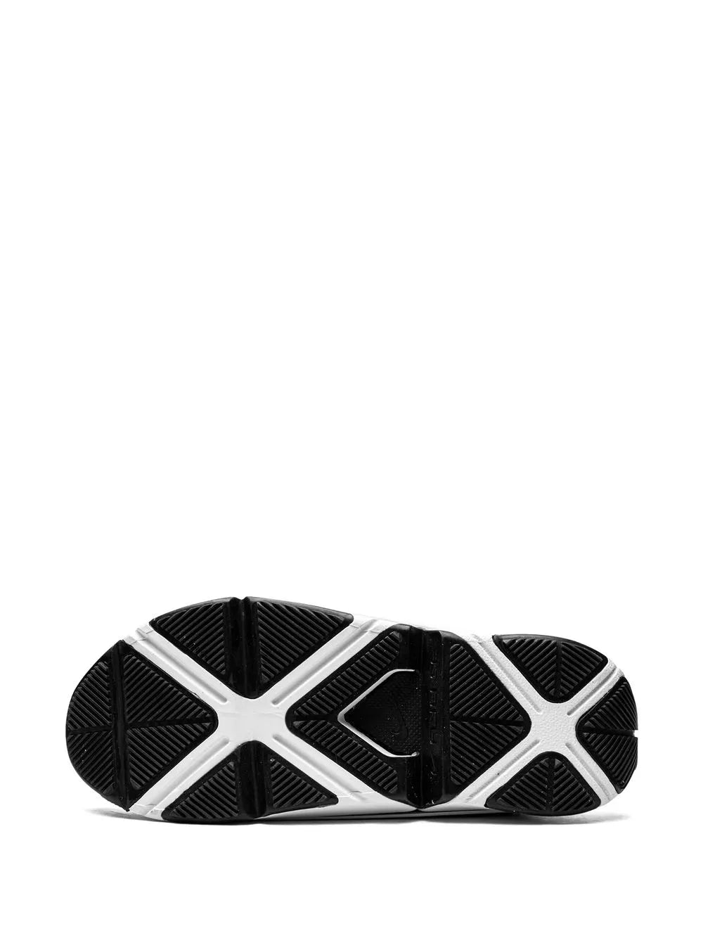 Black rubber outsole with white traction pods for slip-on sneaker