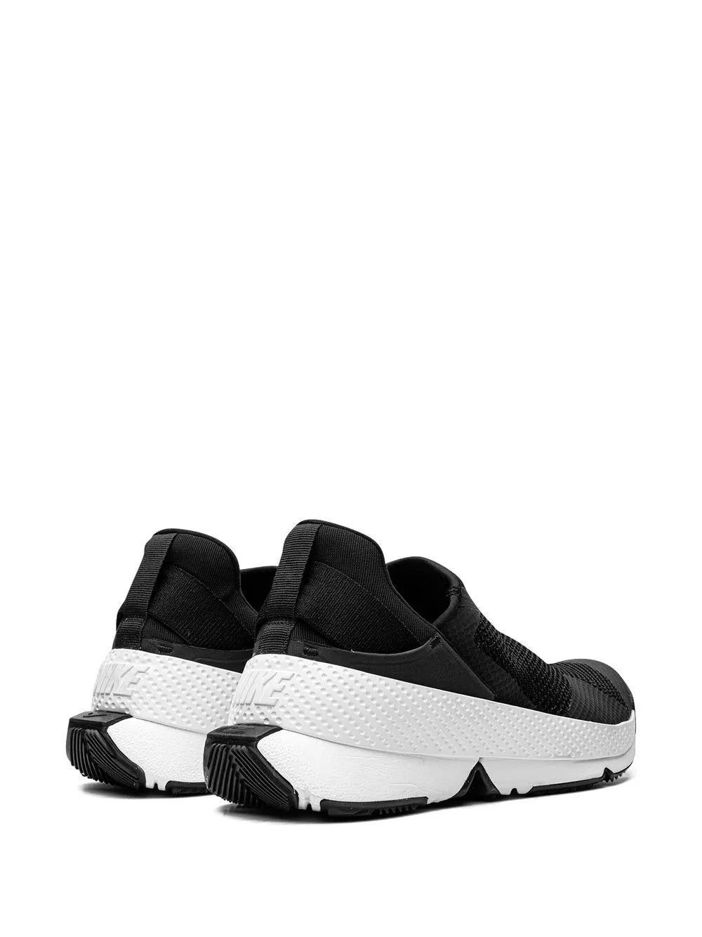 Black slip-on sneaker rear view with white midsole and cushioned support
