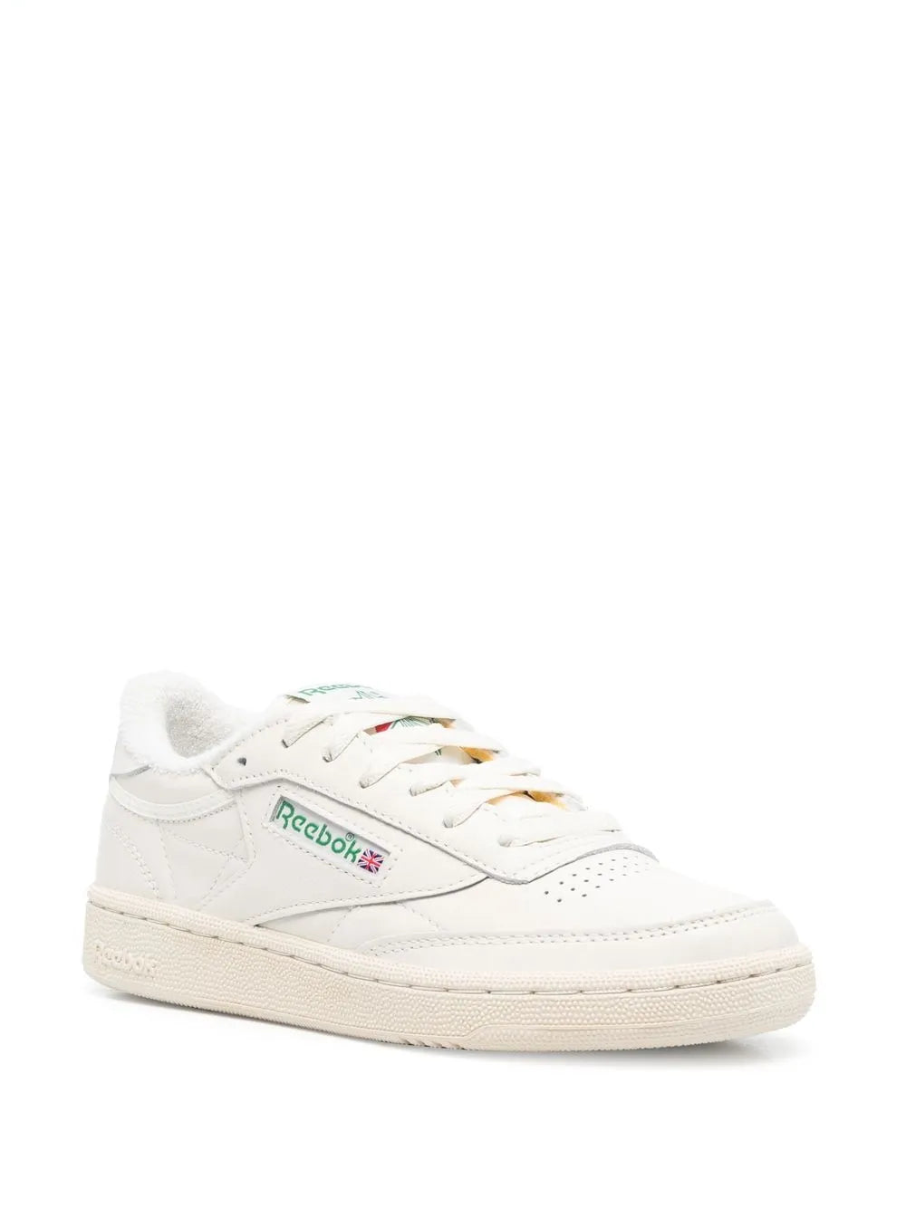 Reebok light beige low-top sneakers, colorful logo graphic on side, lace-up