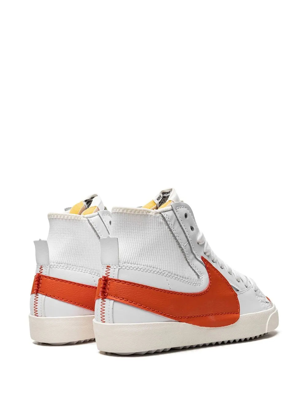 High-top sneaker rear view with orange Swoosh on white upper and padded heel