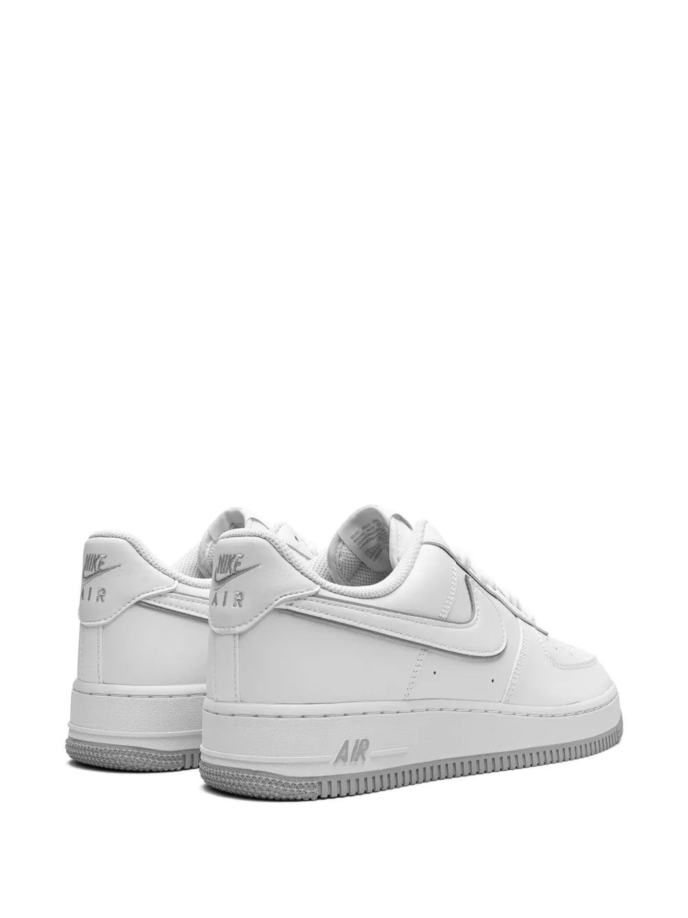 Nike Air Force 1 low sneakers, white pair with heel tab and rear view Air