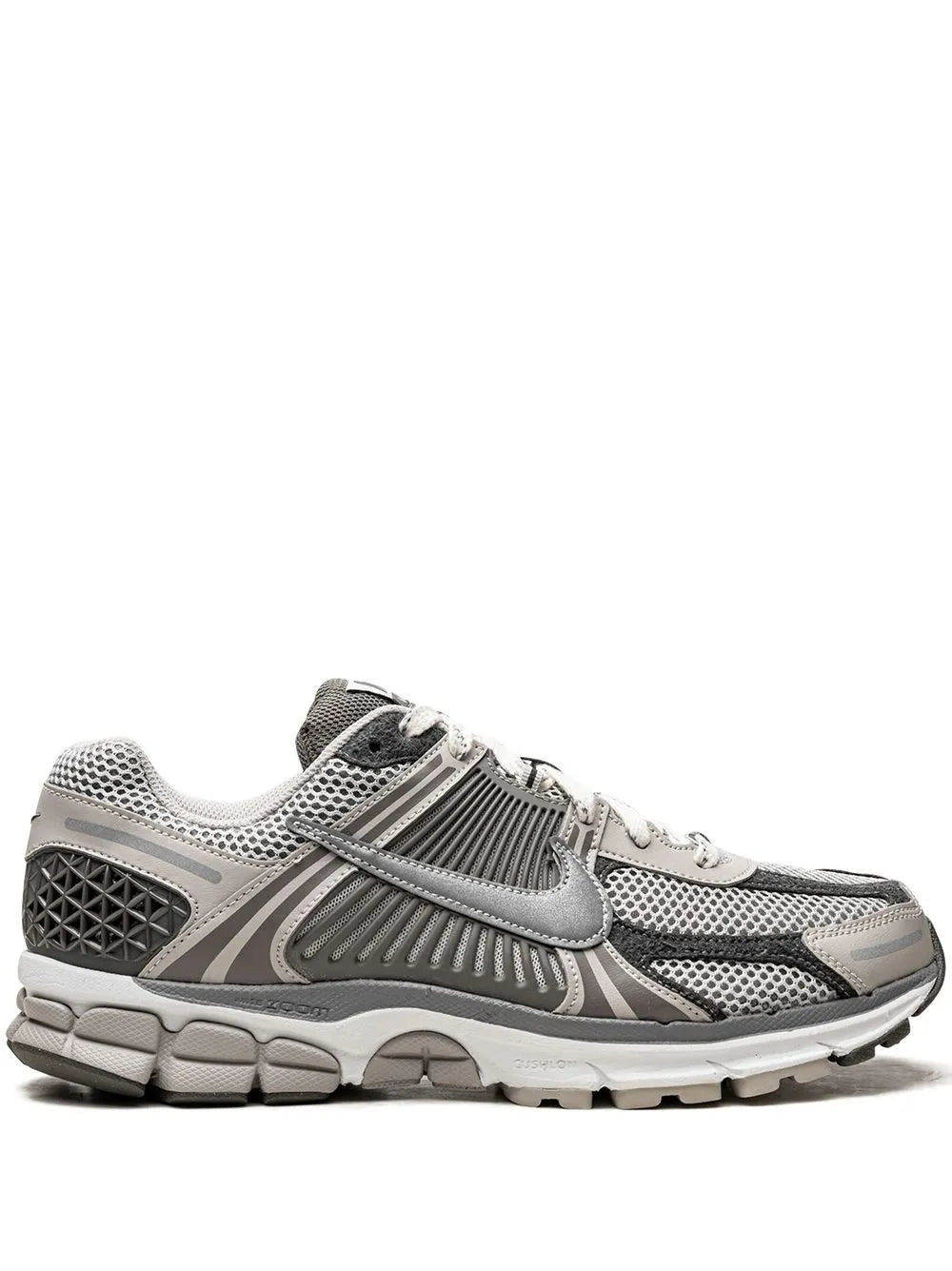 Nike running sneaker in light gray mesh with dark gray panel overlays