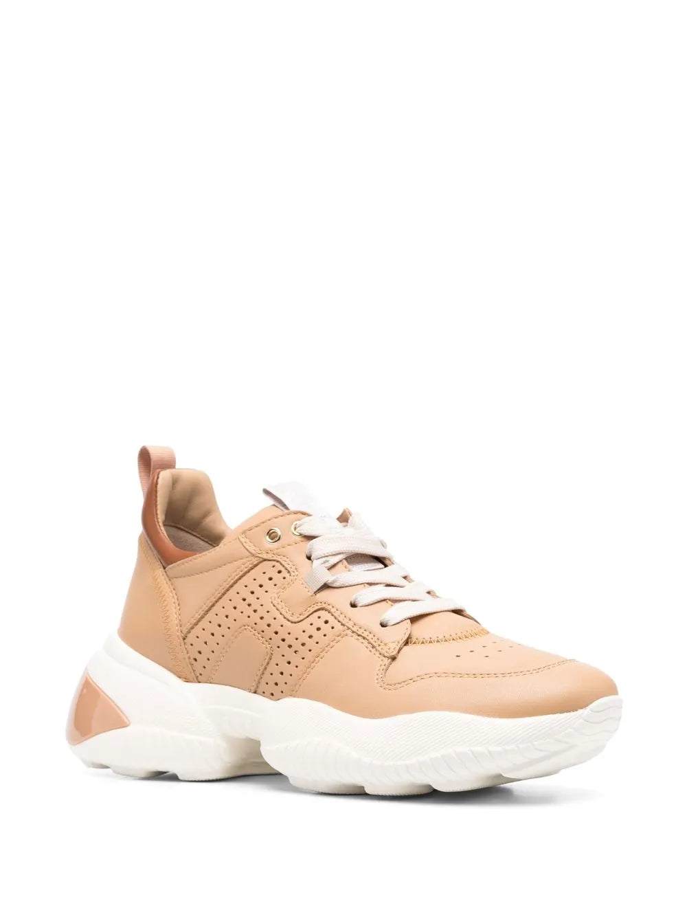 Tan low-top sneaker, side view, white laces and thick white midsole