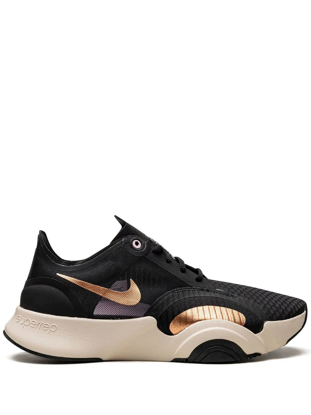 Black low-top training shoe with tan Swoosh and cushioned midsole
