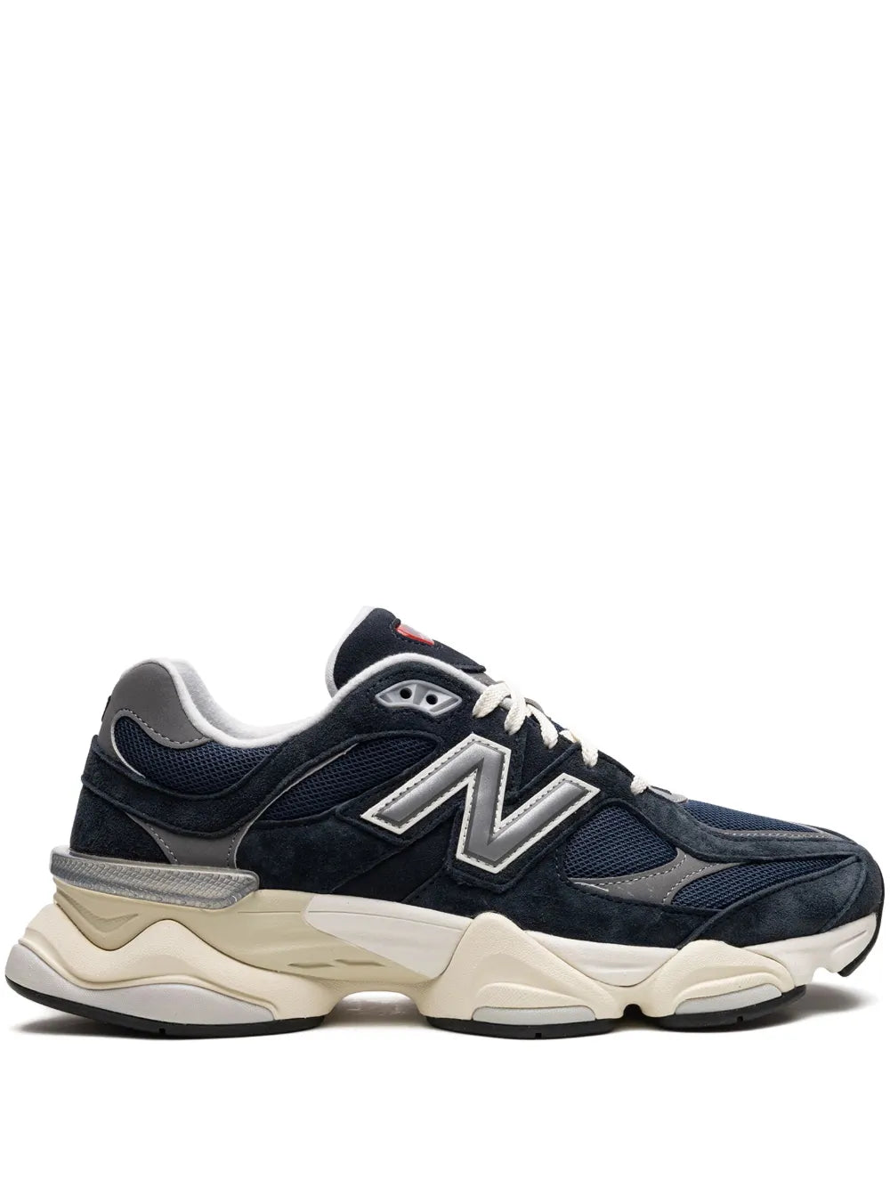 New Balance 9060 navy sneakers with white N logo, cream midsole and black accents