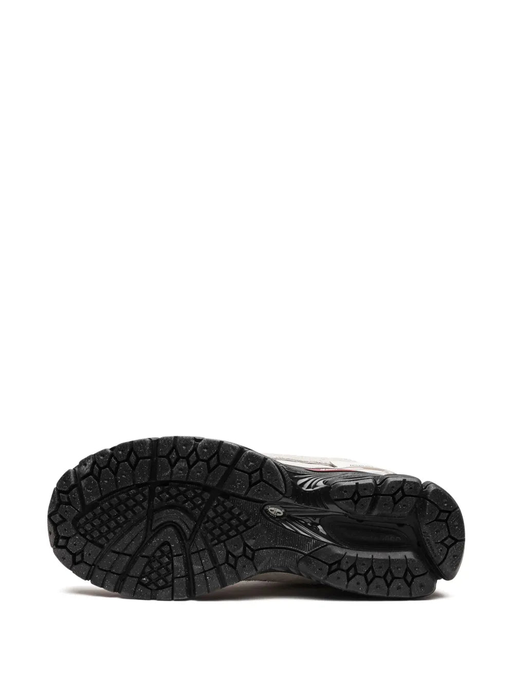 New Balance 1906R sneaker outsole tread, black rubber with textured grip pattern