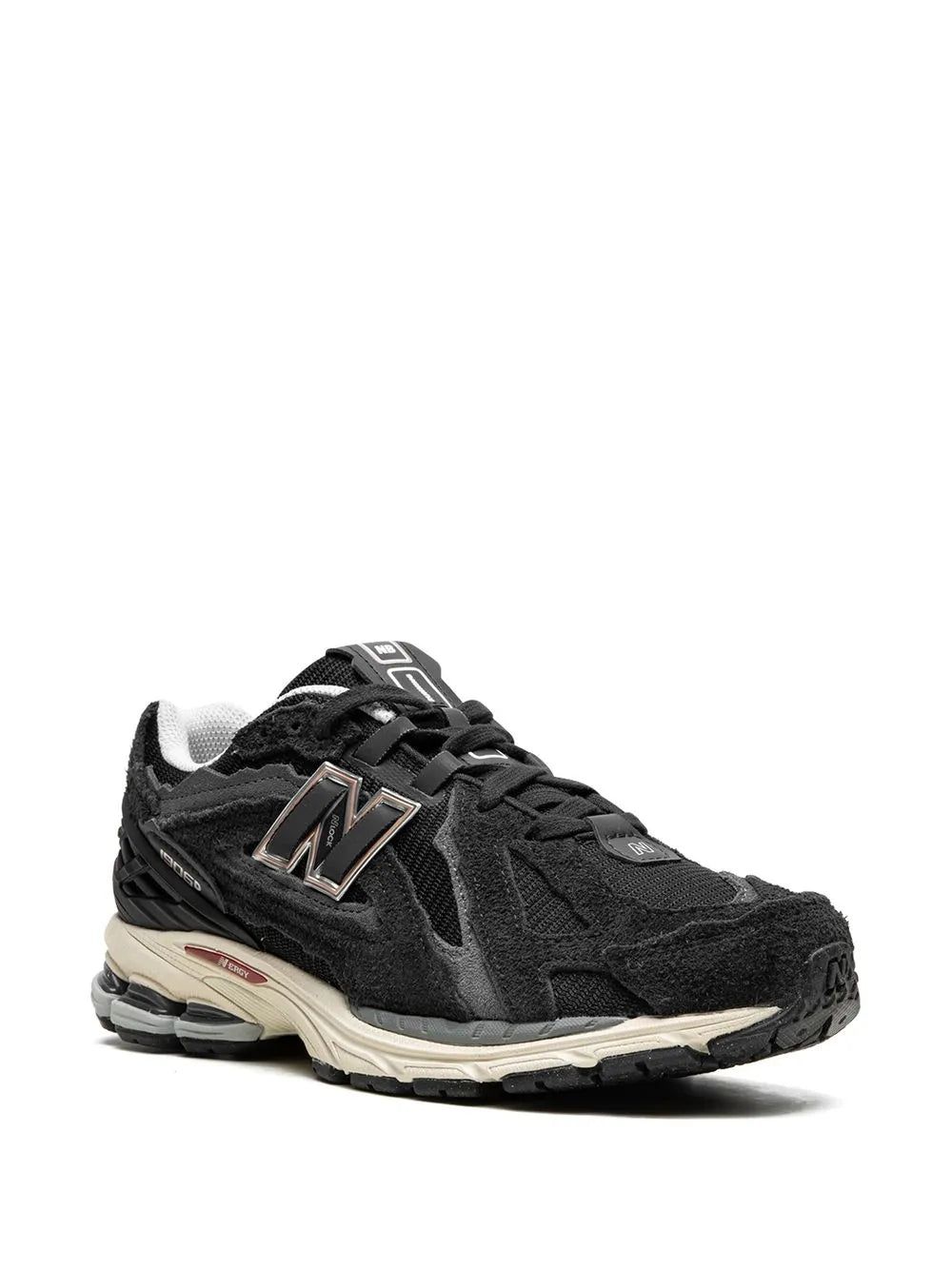 Black lace-up sneakers, front 3/4 view with N logo and padded collar, rubber sole