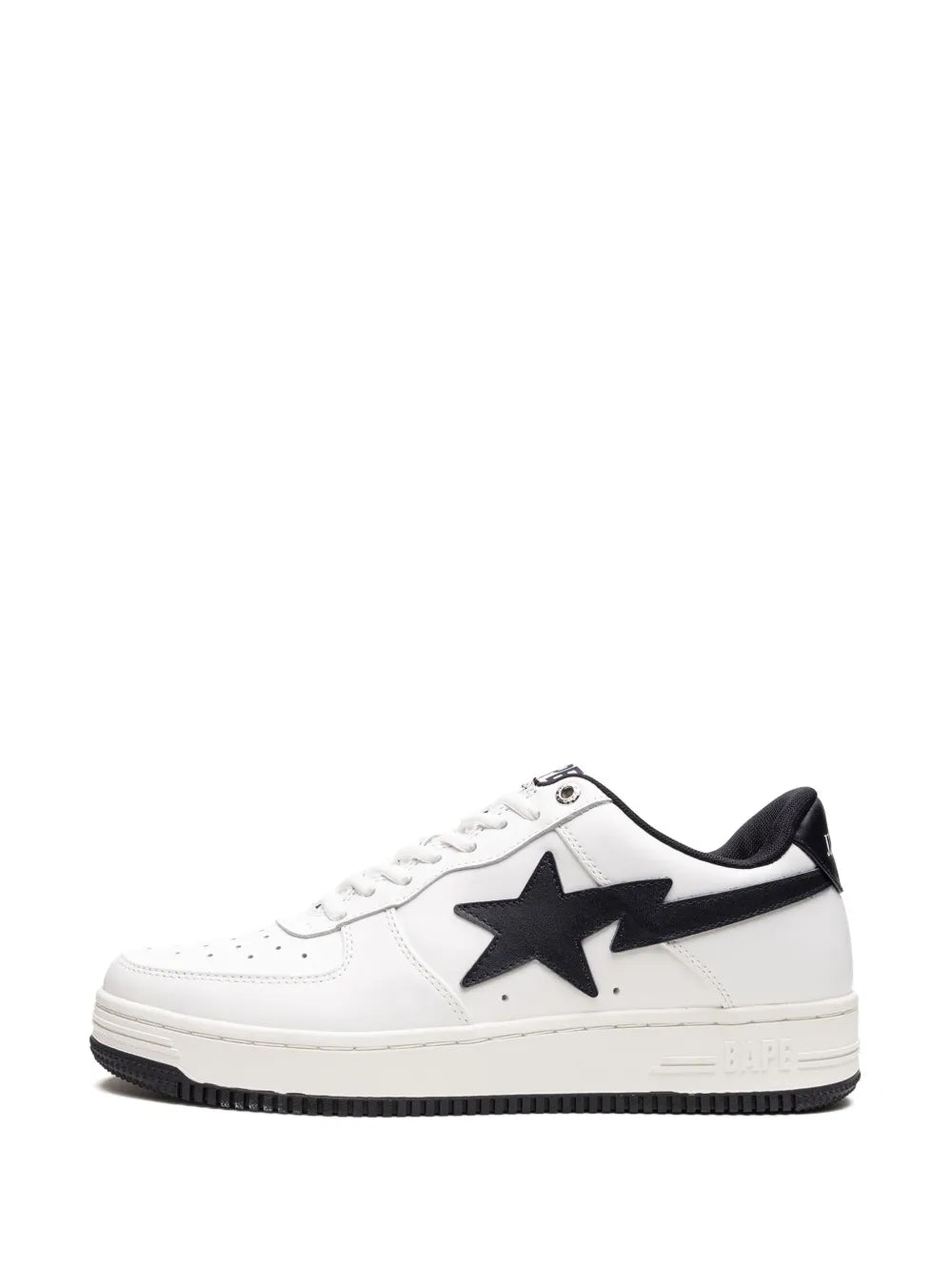 White low-top sneakers with black star emblem, black swoosh stripe, and laces