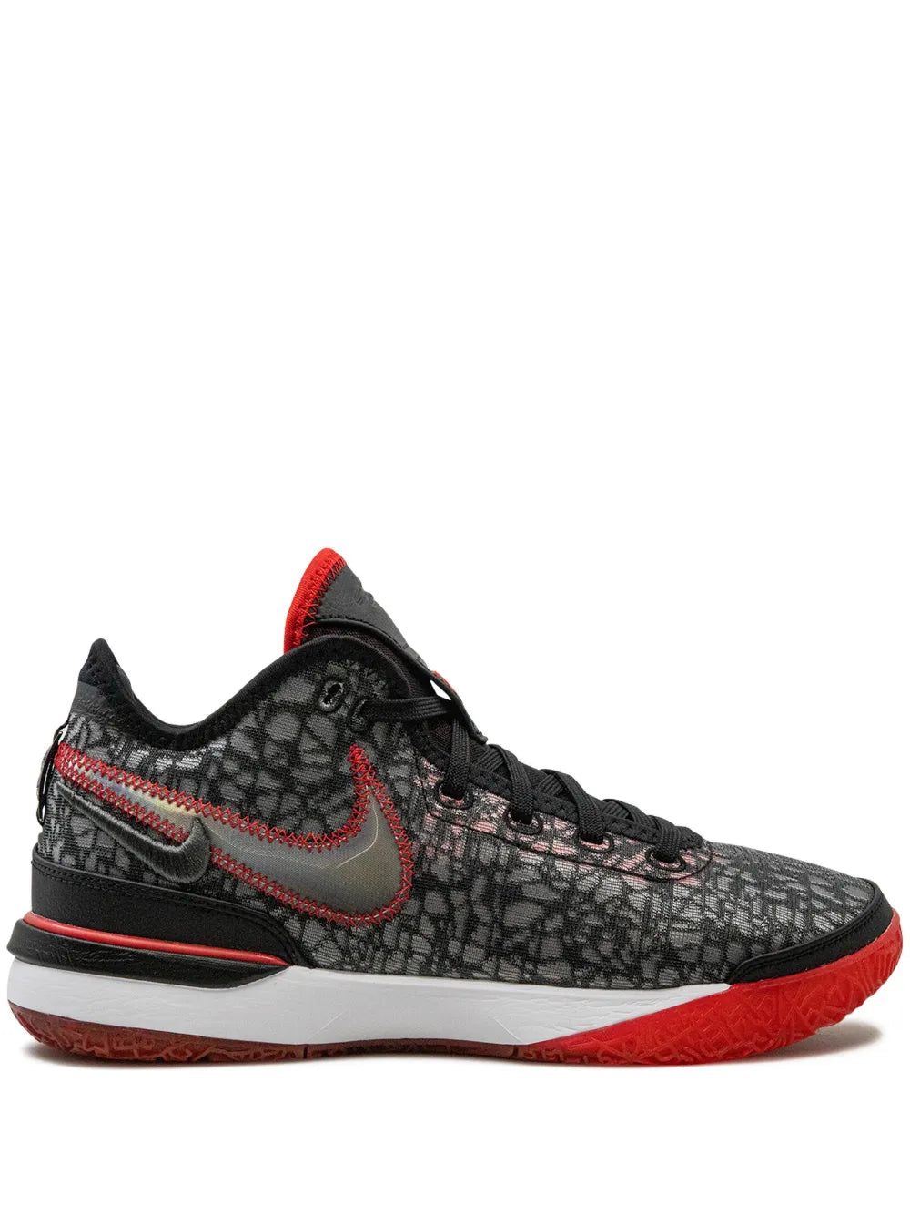 Black and red basketball shoe with Nike swoosh and lace-up mesh upper