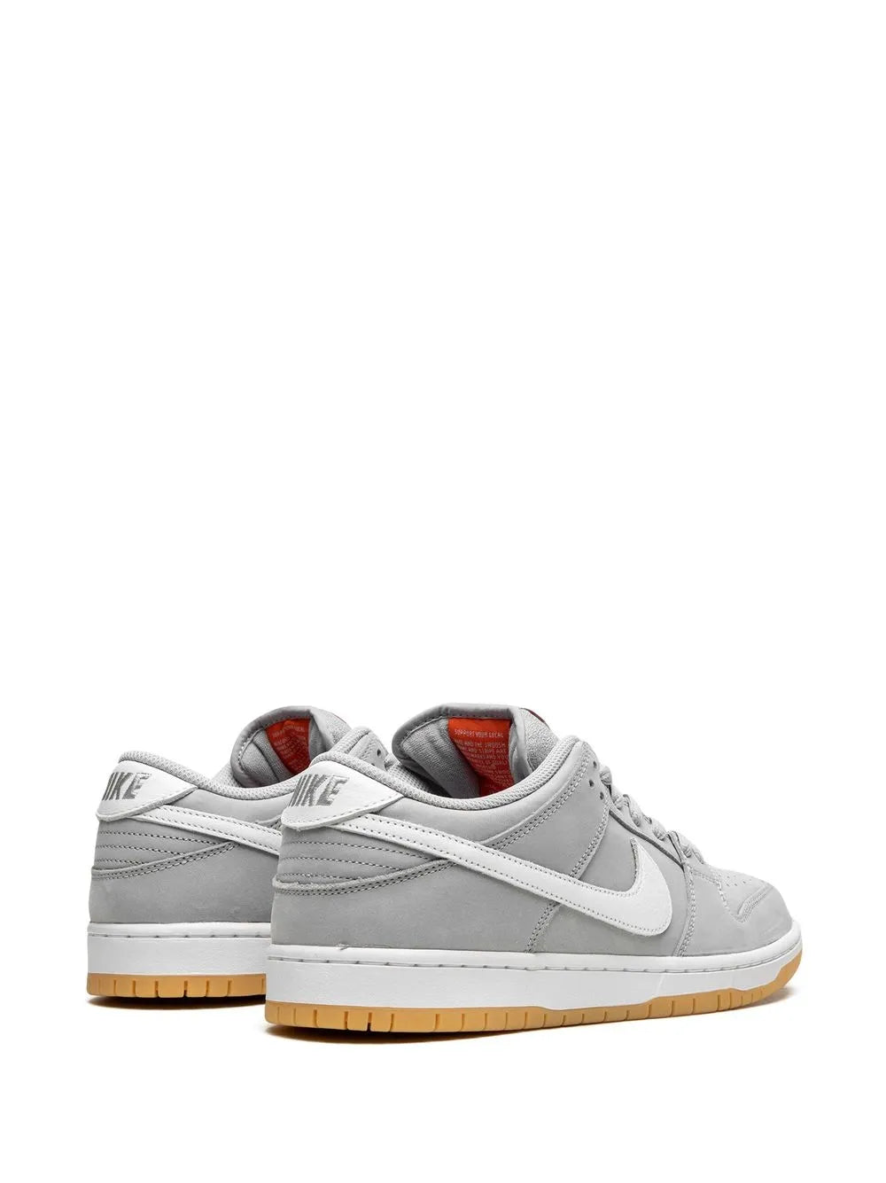 Nike SB Dunk Low Pro ISO sneakers, light gray upper with heel branding, gum sole.