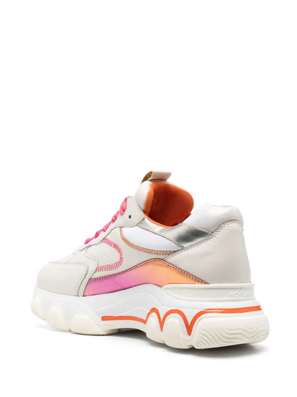 Rear three-quarter view of white low-top sneaker with hot pink laces and orange sole