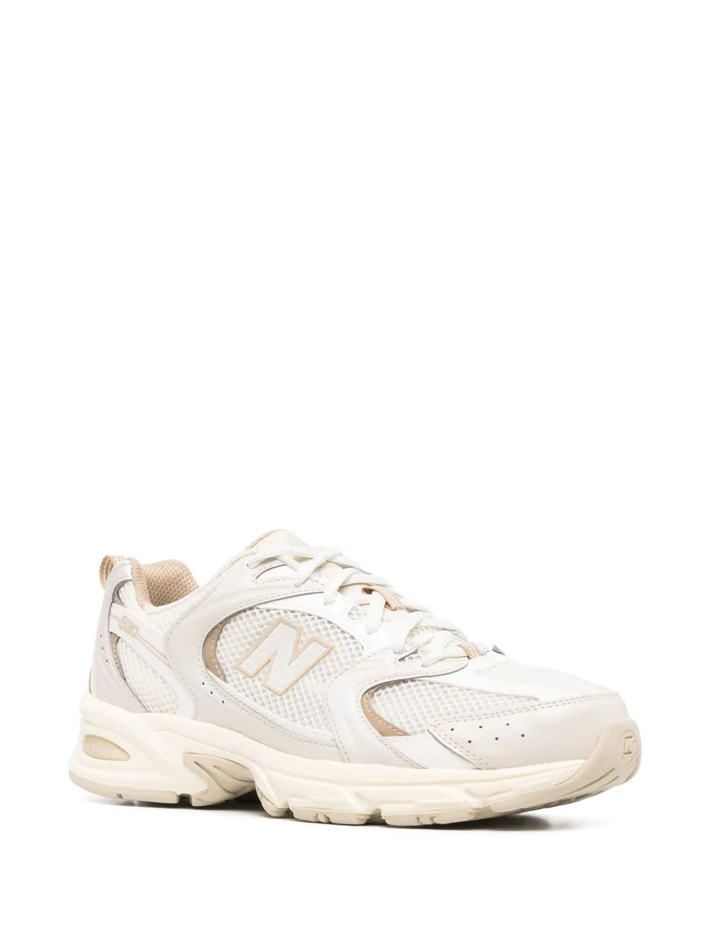 Cream white low-top sneakers, side view, mesh panels, N logo patch, lace-up