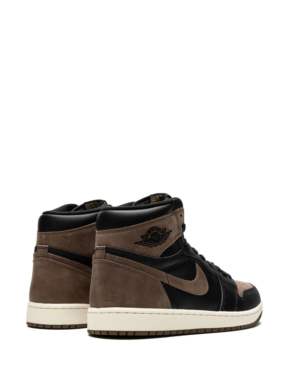 Pair of black and brown high-top lace-up sneakers with cream outsoles, rear view