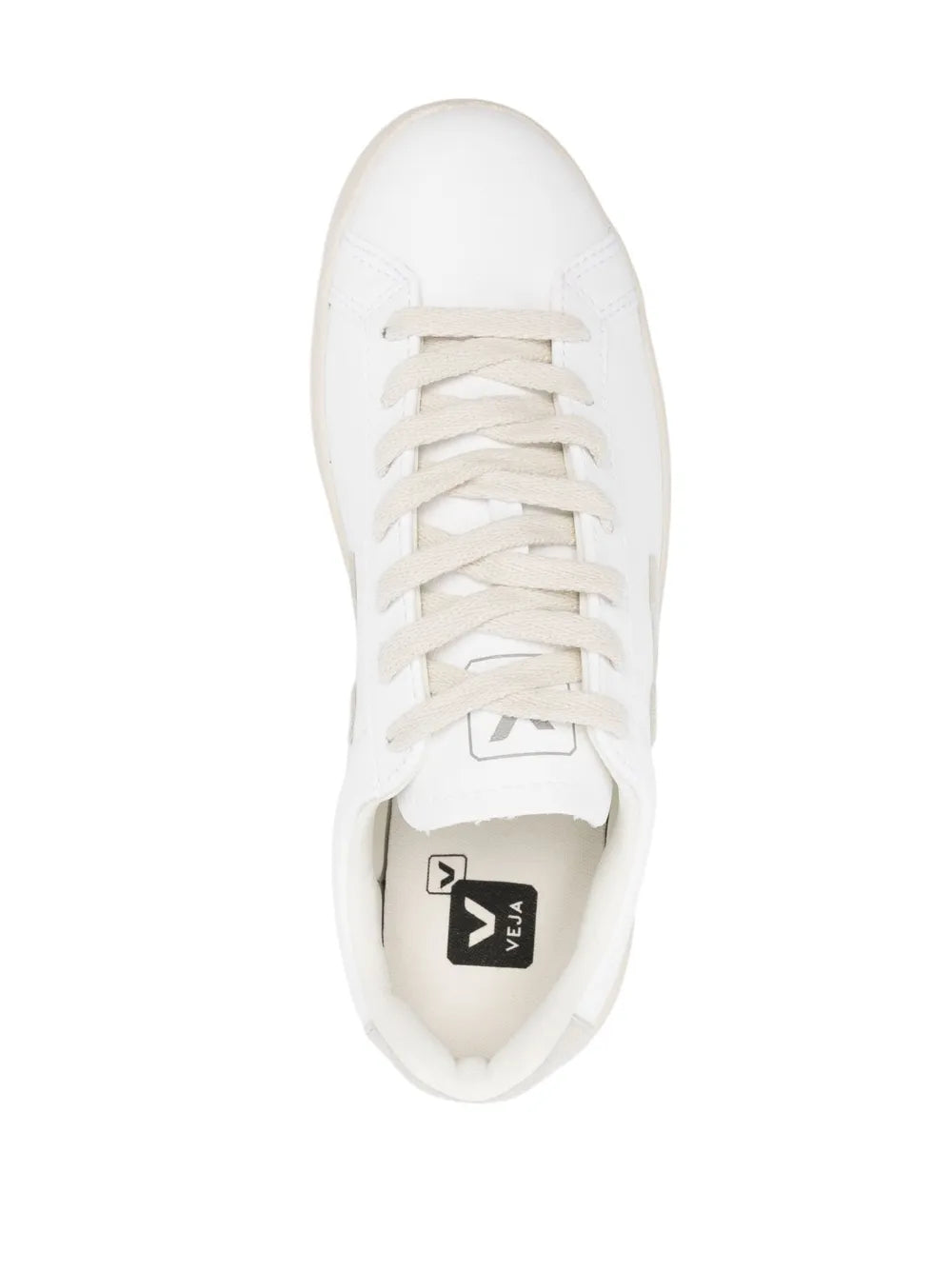 White lace-up sneakers with laces and VEJA tongue label