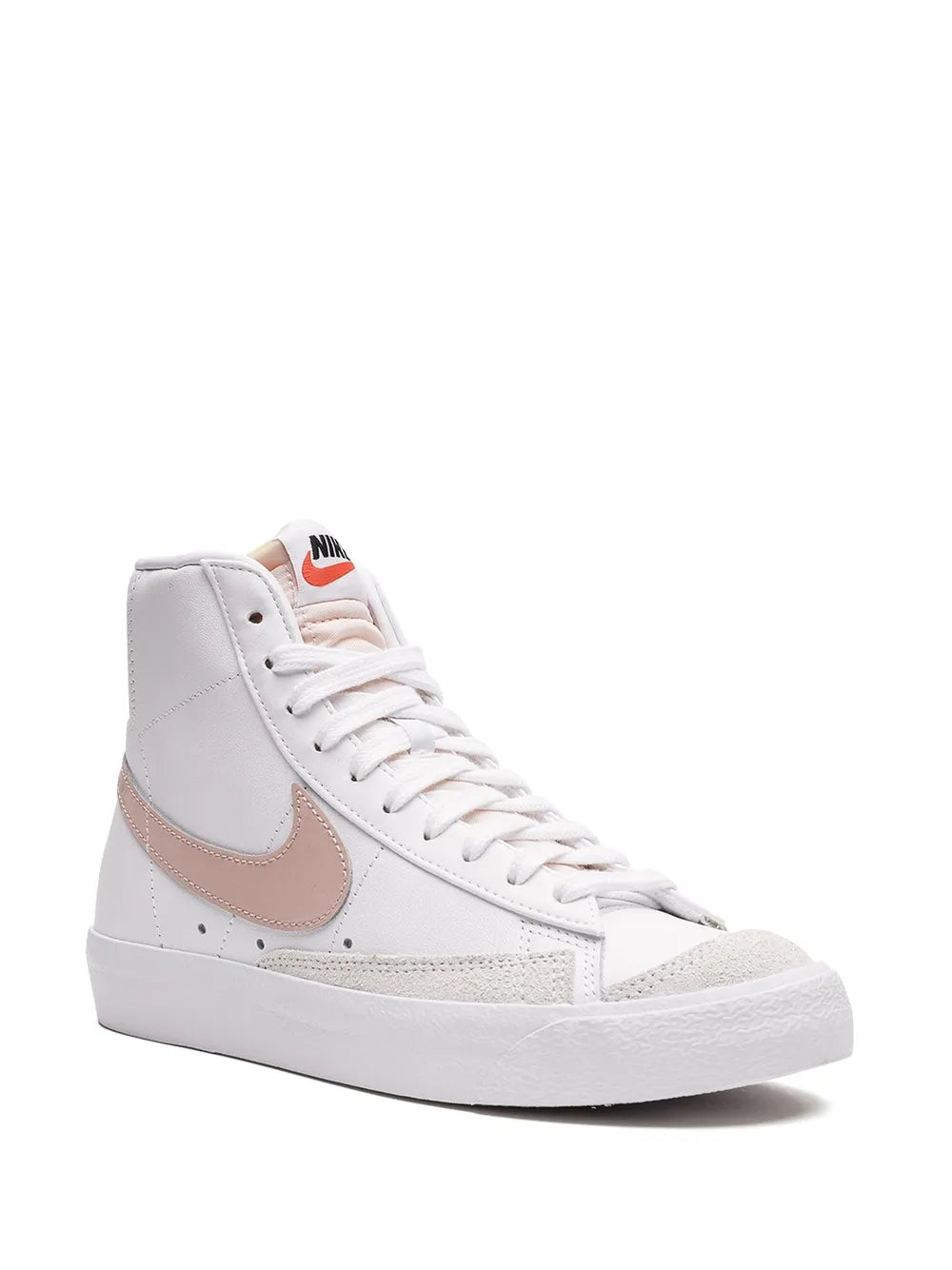 Nike mid-top sneakers, white upper with tan/pink swoosh and lace-up front
