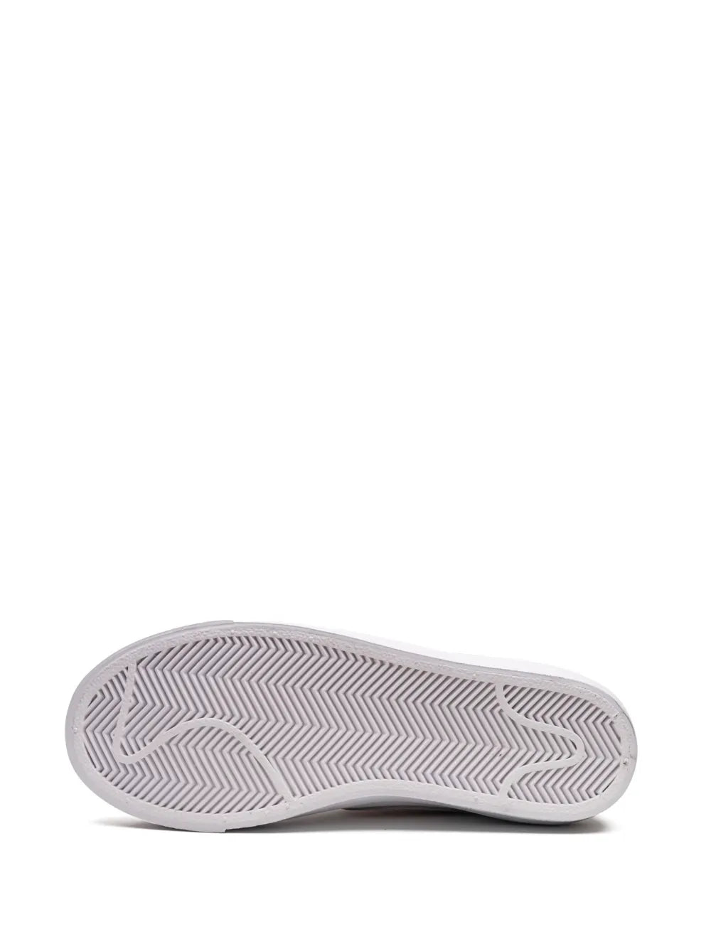 Nike sneaker outsole, white rubber with zigzag tread pattern