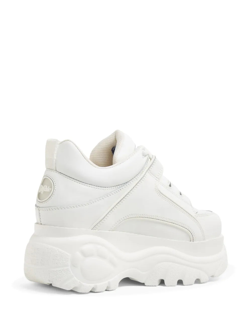 White low-top sneaker with layered platform sole and visible heel profile