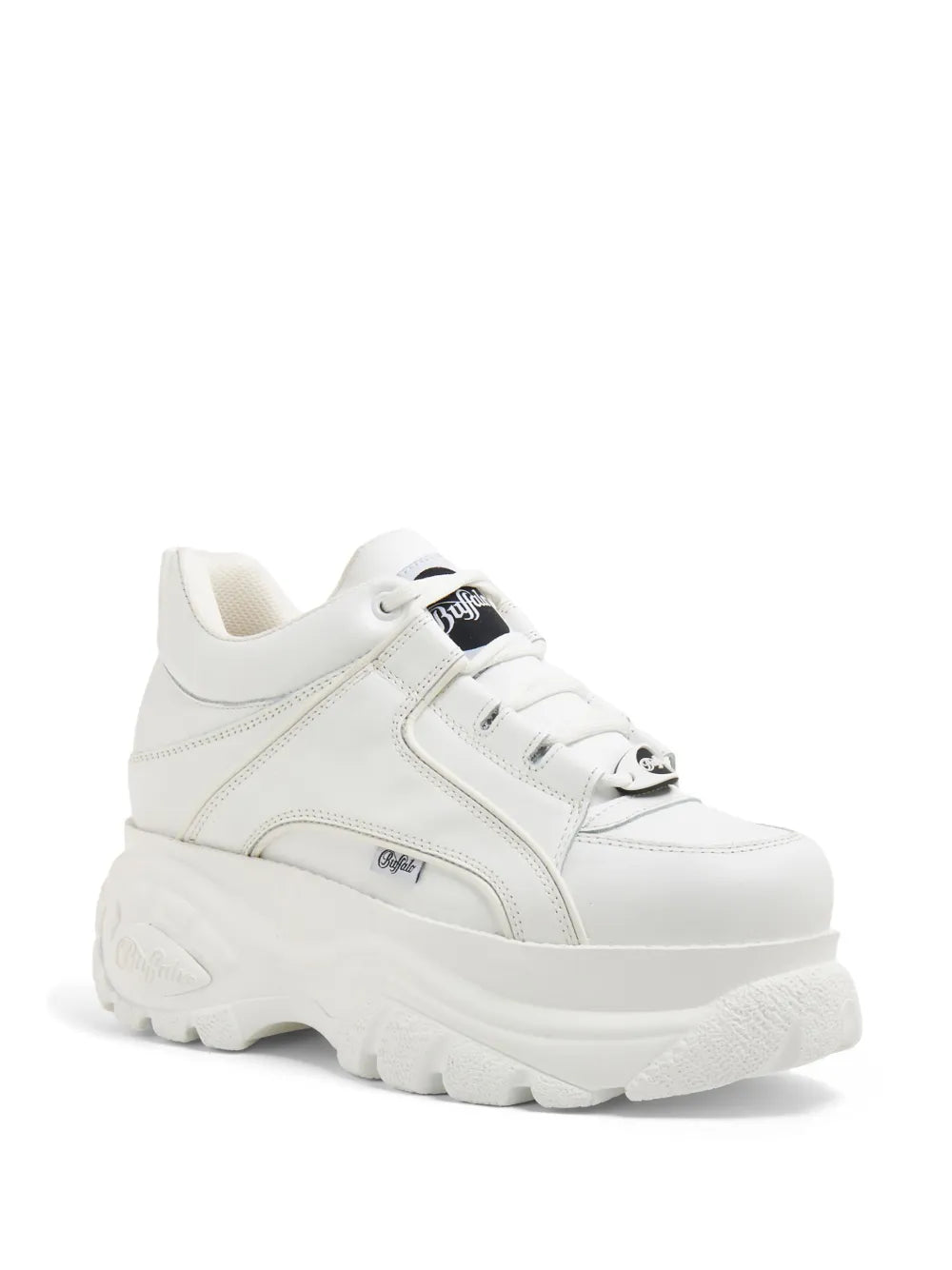 White low-top lace-up sneakers with thick treaded sole and side logo patch